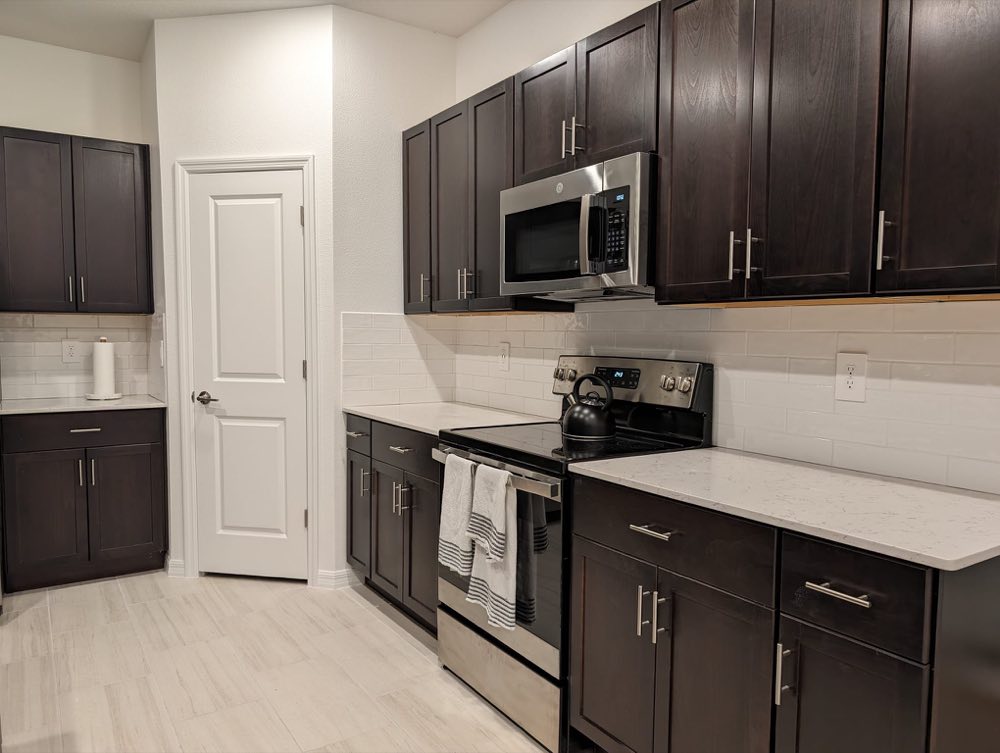 Finished kitchen with new subway tile backsplash