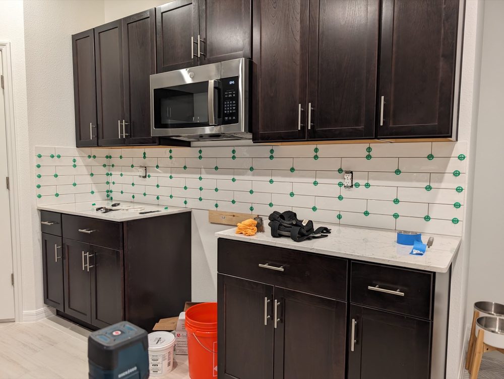 Kitchen backsplash during tile installation