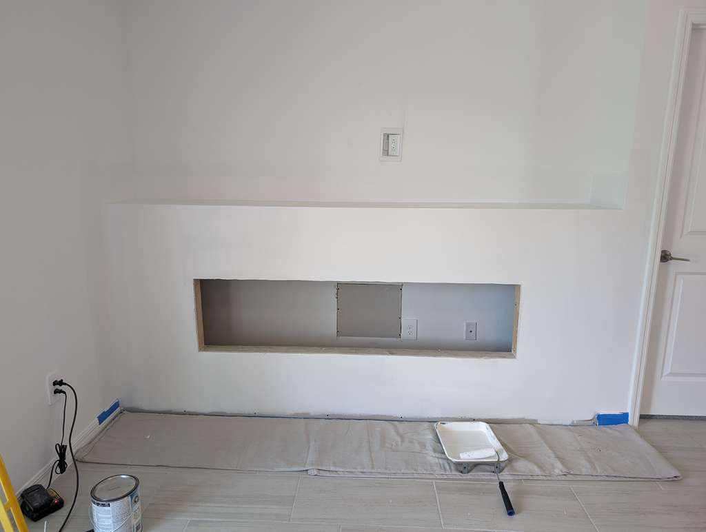 Fireplace wall before renovation