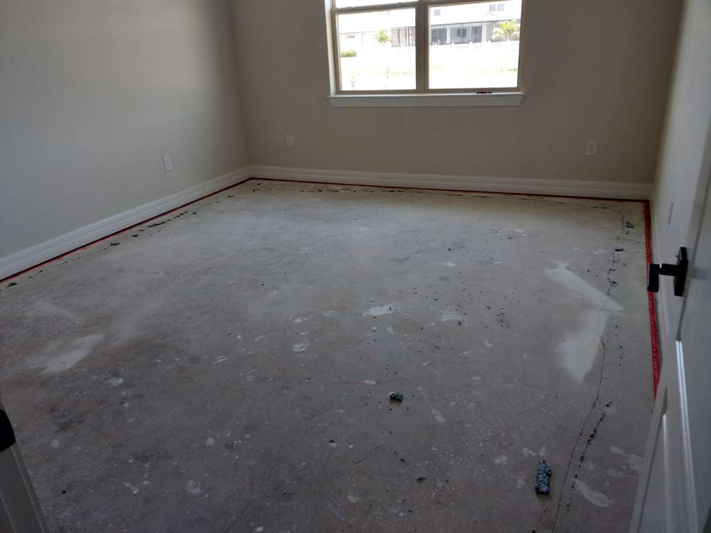 Bedroom before flooring renovation